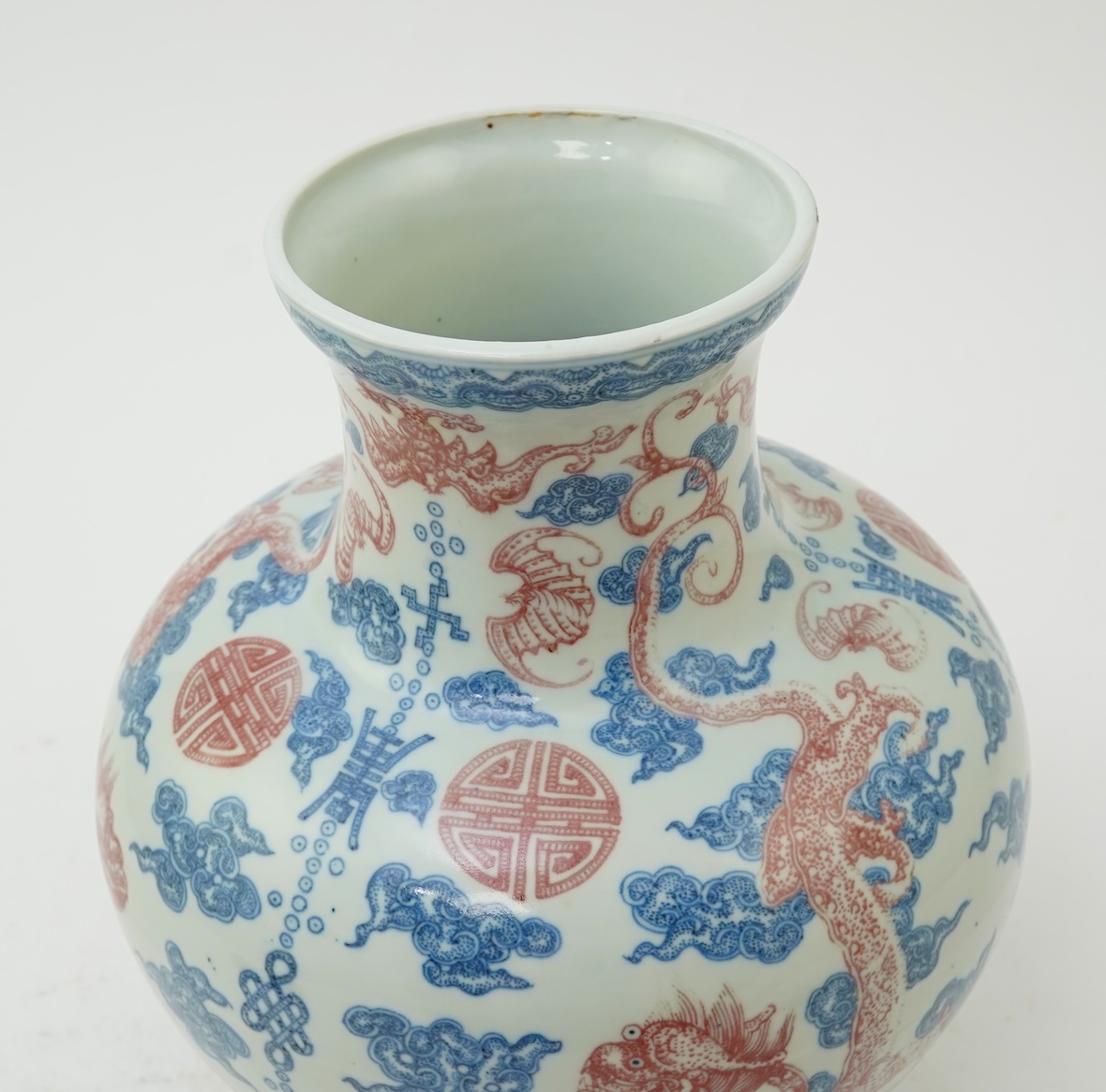 A Chinese underglaze blue and copper red ‘dragon’ vase, Qianlong seal mark but early 20th century